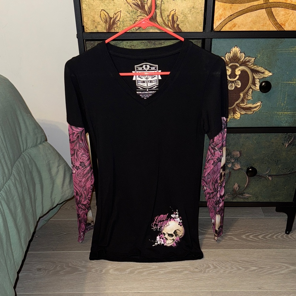 Edgy Black Long Sleeve Top with Pink Skull Design